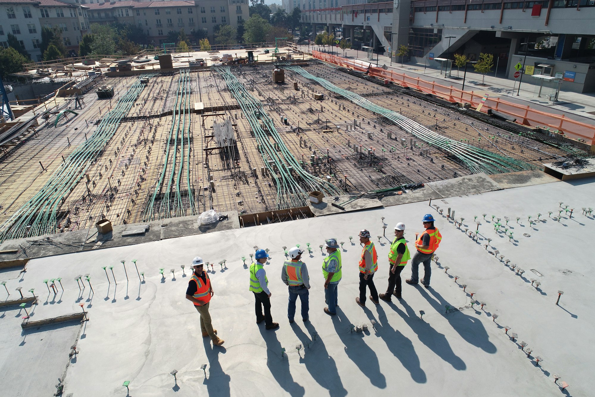Construction team reviewing drawings on site